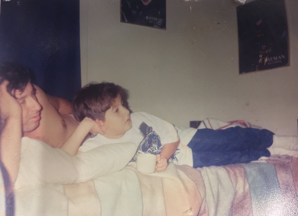 Lucas at age 8 with his father